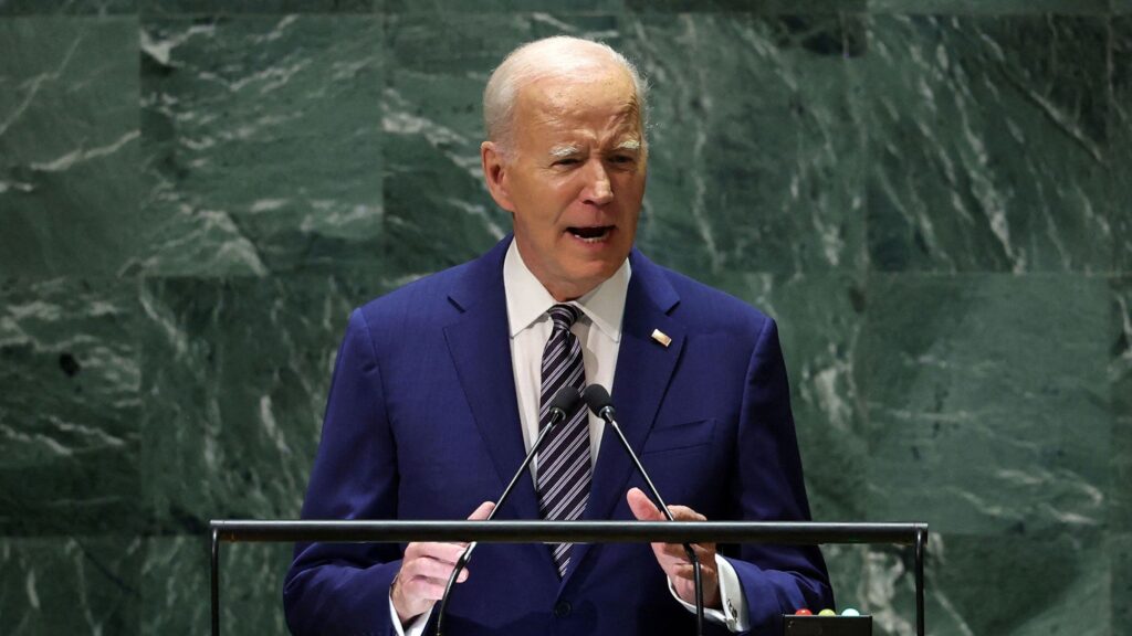 Joe Biden addresses reporters at a press conference